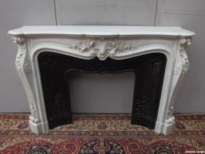 CARVED LOUIS XV STYLE FIREPLACE IN WHITE CARRARA MARBLE, EARLY 19TH CENTURY, FRANCE, 162x42x108 cm